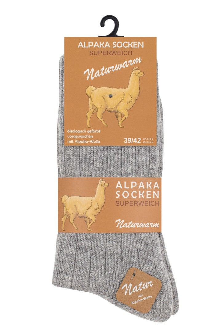 Alpaka uldsokker i lyse farver, elegante beige nuancer, holder formen og varmen vask efter vask.